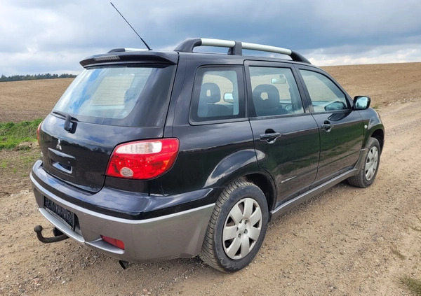 Mitsubishi Outlander cena 14900 przebieg: 214100, rok produkcji 2005 z Chełmno małe 29